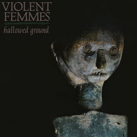 Album cover for 'Hallowed Ground' by Violent Femmes featuring a metallic statue-like figure.
