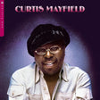 Album cover with a portrait of a person wearing glasses and a cap, with 'Curtis Mayfield' text at the top.
