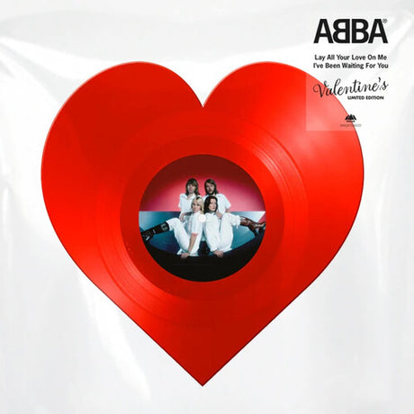 Red heart-shaped vinyl record with ABBA image on a white background