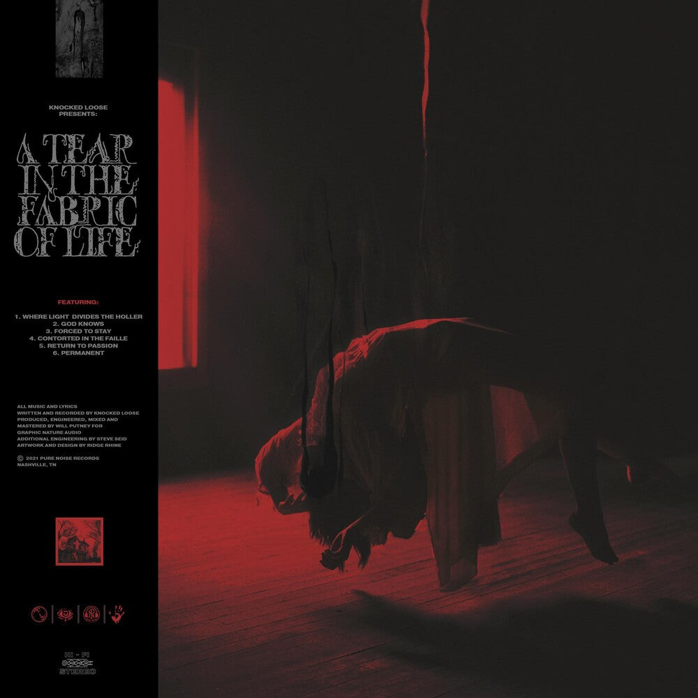 Album cover with a dark and moody scene, featuring a person lying on the ground with a red light.