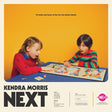 Album cover with two children playing a board game, featuring text about tracks and hours of fun for the whole family.