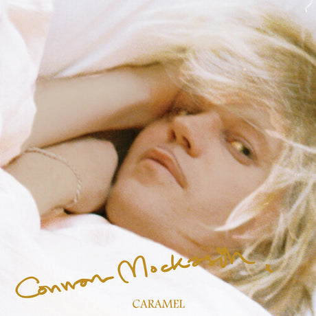 Album cover with a close-up of a person's face, featuring the name 'Connor Mocksin' and the title 'Caramel'.