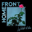 Flower against a blue wall with 'Home Front' and 'Watch it die' text.