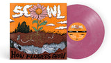 Vinyl record with a colorful cover featuring a flower and text, alongside the actual pink vinyl disc.