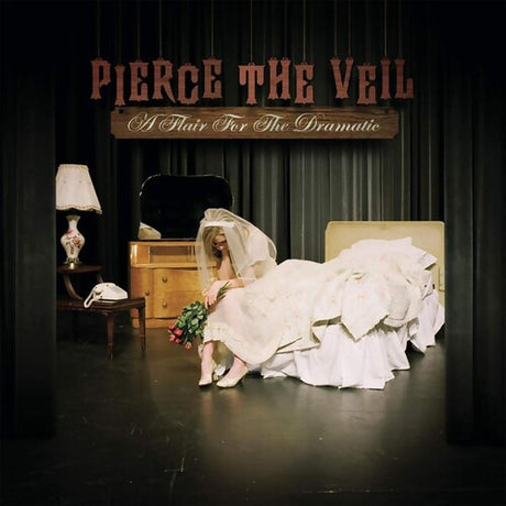 Album cover with a person in a white dress sitting on a bed, text 'Pierce The Veil' at the top.