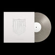 Vinyl record with a white sleeve featuring a logo on a black background