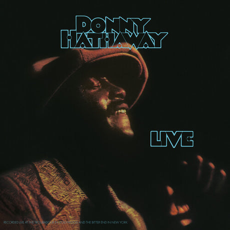 Album cover with a person wearing a cap and text 'Donny Hathaway Live' on a dark background