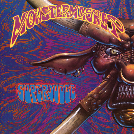 Album cover with a creature's head and 'Monster Magnet' and 'Supernovae' text on a colorful background