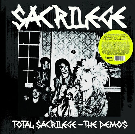 Vinyl record cover with 'Sacrilege' band members and text 'Total Sacrilege - The Demos'.