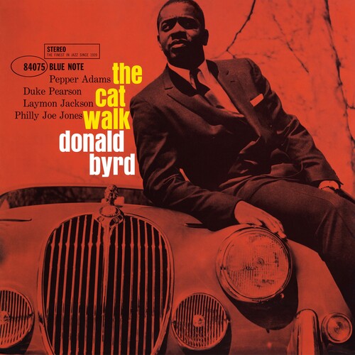 Album cover with a man sitting on a car, featuring text about 'The Cat Walk' by Donald Byrd.