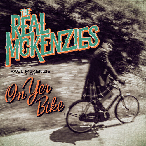 Album cover for 'On Yer Bike' by The Real Mckenzies with a person riding a bike.