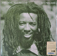 Album cover featuring a person with dreadlocks and text 'Freddie McGregor Showcase' on a green background.
