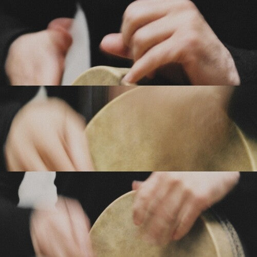 Close-up of hands cleaning a brown leather hat with a white cloth.