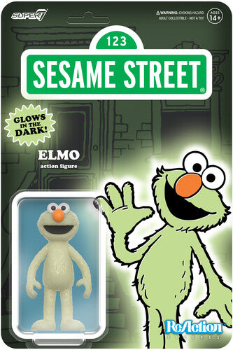 Sesame Street Elmo action figure packaging with glow-in-the-dark feature
