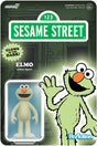 Sesame Street Elmo action figure packaging with glow-in-the-dark feature