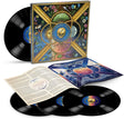 The album 'Breathe' by Fleetwood Mac is shown in its complete package, including the illustrated square outer sleeve, three black vinyl records, an open inner sleeve with printed inserts, and a blue jewel case lid, all arranged on a white background.