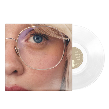 Vinyl record with a close-up of a person wearing glasses and a clear record.
