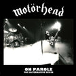 Motorhead 'On Parole: The Alternative Mixes' album cover featuring a black-and-white concert photo of a guitarist and drummer on stage, with the Motorhead logo at the top and album title at the bottom.