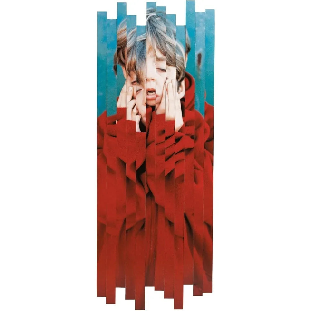 Person wearing a red outfit with a blue background