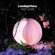 Album cover for 'LateNightTales' by Hot Chip featuring a glowing spherical light in a natural setting.
