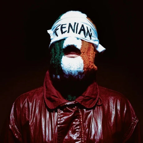 Person wearing a balaclava with 'FENIAN' text and an Irish flag design, against a dark background.