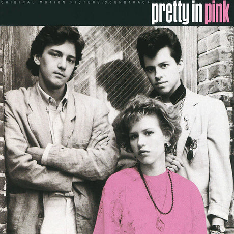 Album cover for 'Pretty in Pink' with a black and white photo of three people and a pink overlay.