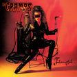 Album cover art for The Cramps' 'Flamejob', featuring a woman in a glossy black latex outfit and thigh-high boots seated in a chair, holding a lit torch, with oxygen tanks behind her against a red-orange gradient background.