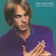 Album cover for Tom Verlaine's 'Words From The Front', featuring a painted portrait of the artist smoking a cigarette against a teal background.