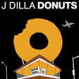 Album cover for 'J Dilla Donuts' with a large donut and a small building.