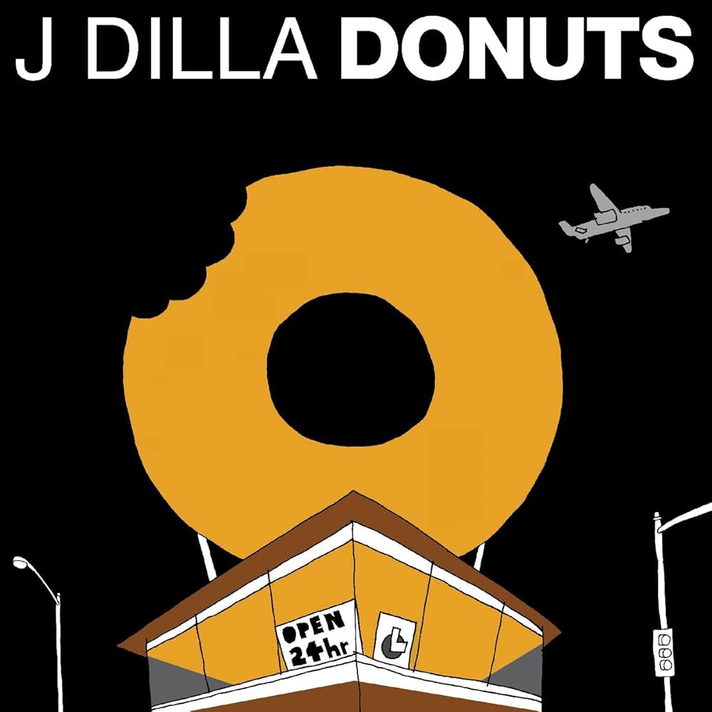 Album cover for 'J Dilla Donuts' with a large donut and a small building.