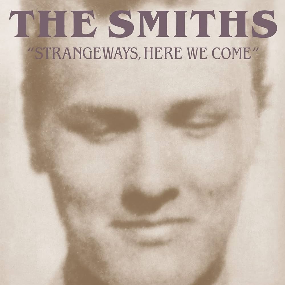 Album cover for 'Strangeways, Here We Come' by The Smiths with a sepia-toned portrait.