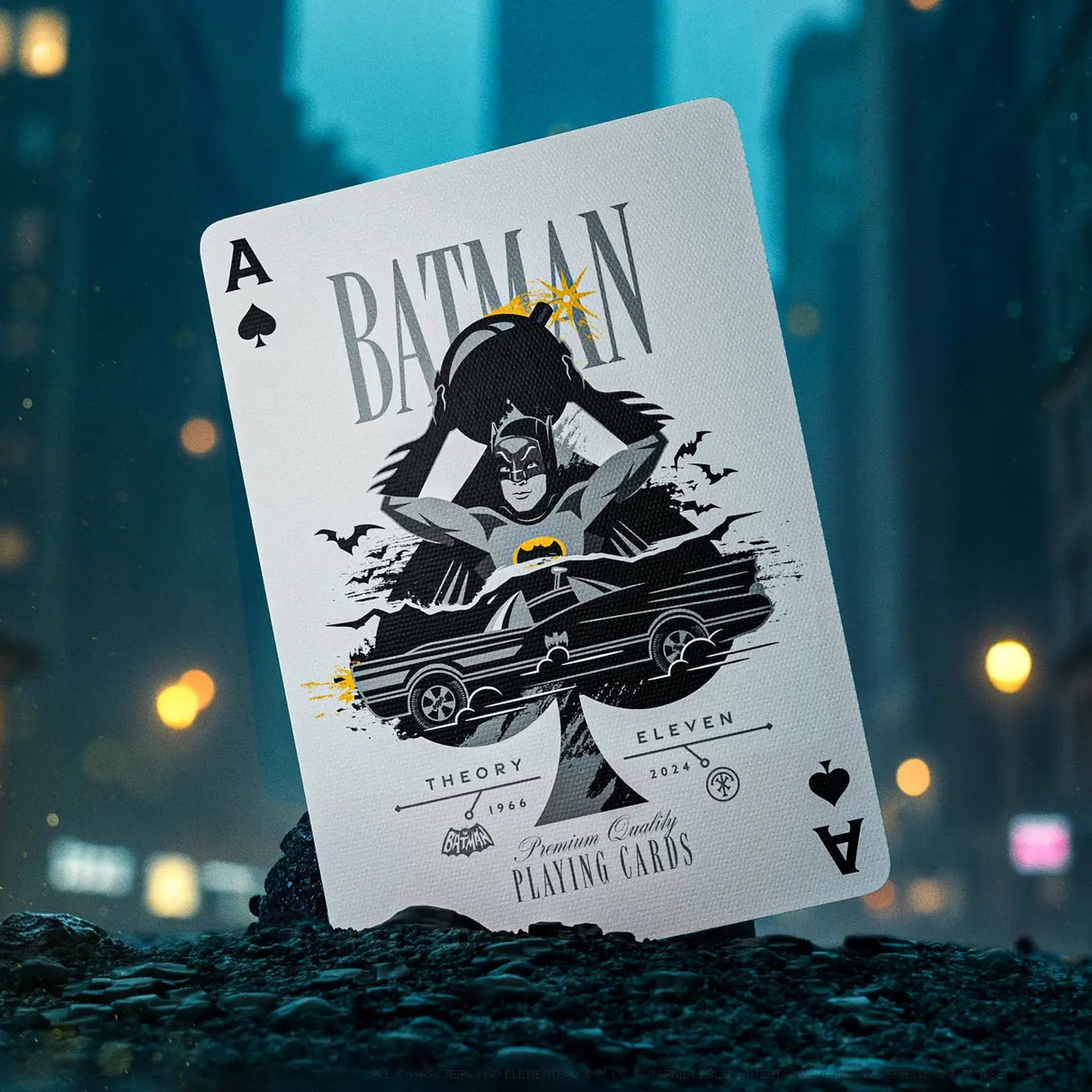 Playing card with Batman design on a blurred cityscape background