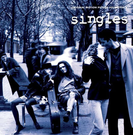 Album cover for 'singles' with a black and white photo of people on a street.