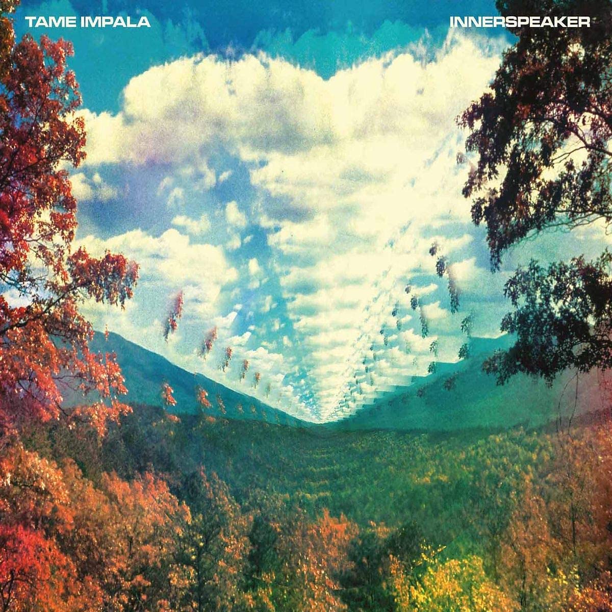 Album cover with a colorful landscape and cloud formation, featuring Tame Impala and Innerspeaker text.