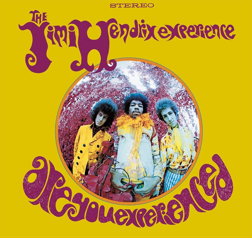 Album cover of 'Are You Experienced' by The Jimi Hendrix Experience with a yellow background and circular photo of the band.