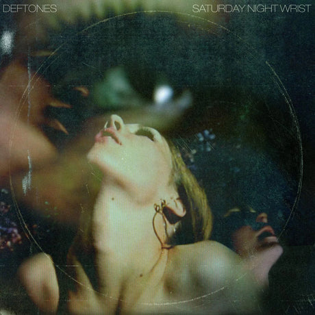 Album cover for 'Saturday Night Wrist' by Deftones featuring a person with a butterfly on their neck.