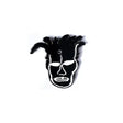 Black and white mask-like pin on a white background