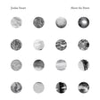 Album cover with black and white circular patterns and text 'Jordan Smart Above the Street' at the top.