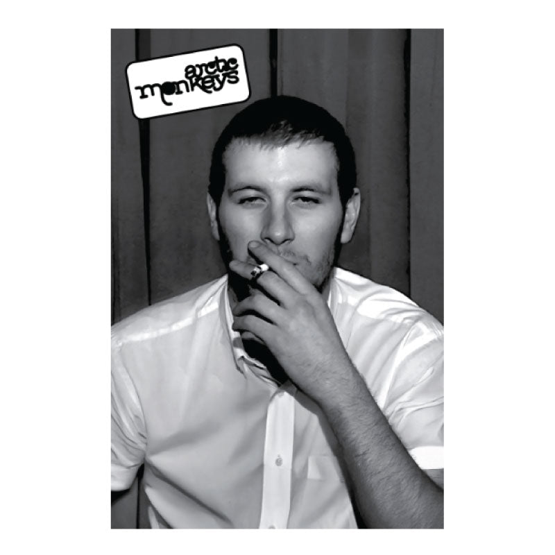 Black and white photo of a man smoking with ' Arctic Monkeys ' logo above