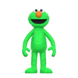 Green plush toy with an orange nose on a white background