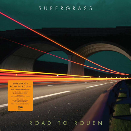 Album cover for 'Road to Rouen' by Supergrass with a bridge and light streaks.