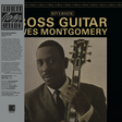 Album cover featuring a man holding a guitar with text about 'Boss Guitar' by Wes Montgomery.