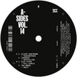 Black vinyl record label for 'A-Sides Vol. 14' with tracklist and branding.