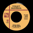 A vinyl record label for 'More Soup (LP Version) - Instrumental' by Moka Only feat. MF Doom, featuring a warm yellow-orange label with black text and red dividing lines on a black background.