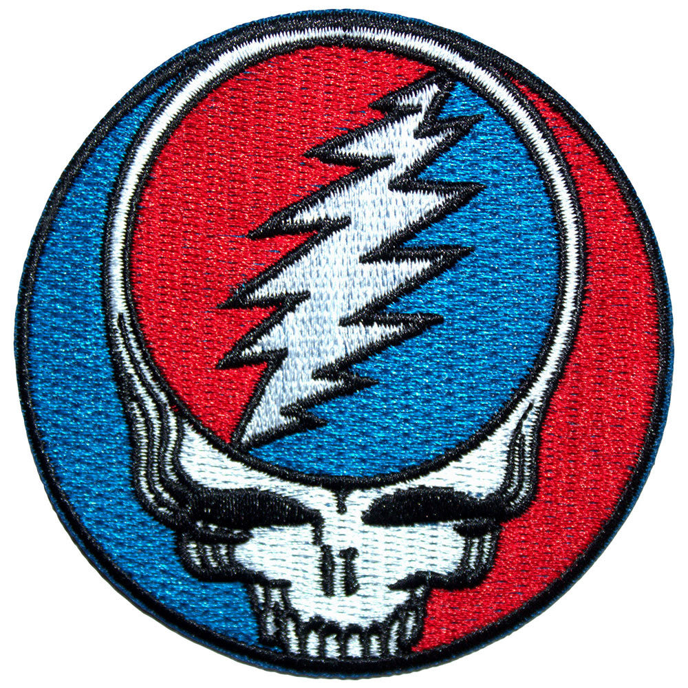 Circular patch with a skull and lightning bolt design on a red and blue background