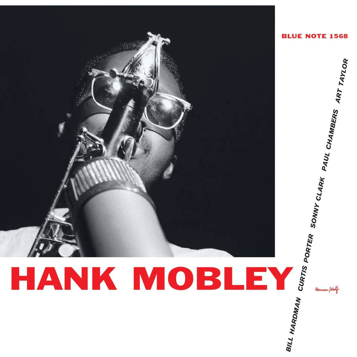 Album cover featuring a saxophone with a person holding it, black and white with red text.