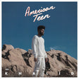 Album cover with a person standing on rocky terrain under a clear blue sky, featuring the text 'American Teen' and 'Khalid'.