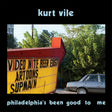 Album cover with a vintage sign and car, featuring Kurt Vile's name and album title.