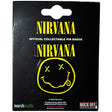 Nirvana collectible pin badge packaging with yellow smiley face design on a black background