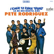 Album cover of 'I Like It Like That' by Pete Rodriguez featuring a group of people in formal attire.
